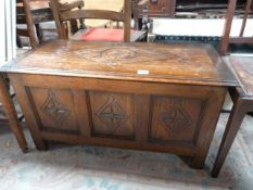 A carved oak chest