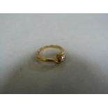 A diamond solitaire ring size L