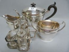 A Mappin & Webb plated tea service and an Art Deco cruet set