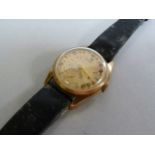 A Tissot 9 ct gold cased gentlemans wristwatch with subsidiary second hand at 6 o'clock