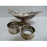 A hallmarked silver bon bon dish ( Birmingham 1898) and two silver serviette rings- total weight