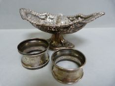 A hallmarked silver bon bon dish ( Birmingham 1898) and two silver serviette rings- total weight