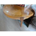 A "Stateroom" round coffee table