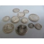 A Victoria Godless Florin ( very worn) a selection of Victorian silver coins, a William III shilling