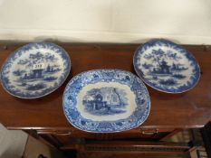 Three blue and white plates