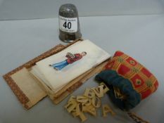 A large thimble, rice pictures etc
