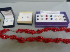 A Red coral necklace, 9ct gold amethyst earrings, silver and blue topaz earrings and a set of