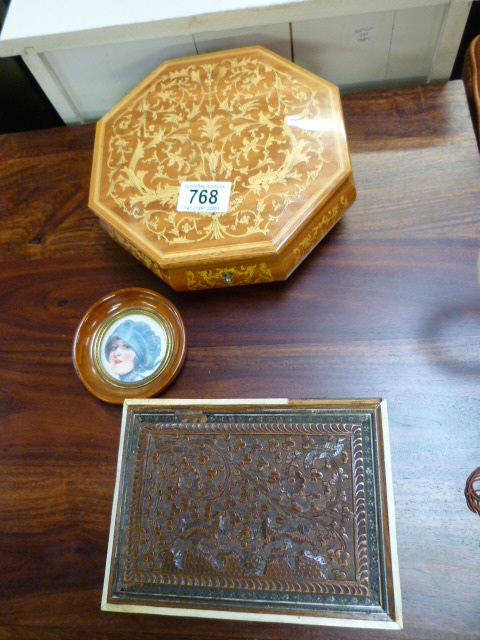 An walnut octagonal Reuge music box inlaid with foliate decoration, A carved oak jewellery box