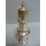 A hallmarked silver sugar caster, Chester 1936- weight 266.4g