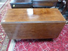 An oak drop leaf table