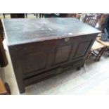 A large oak mule chest with drawer under