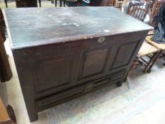 A large oak mule chest with drawer under