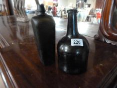 An early mallet shaped bottle and one other