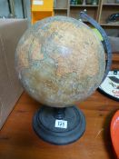 A Philip's 9 inch terrestrial globe on ebonised stand