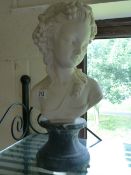 A large bust of a girl in the classical style