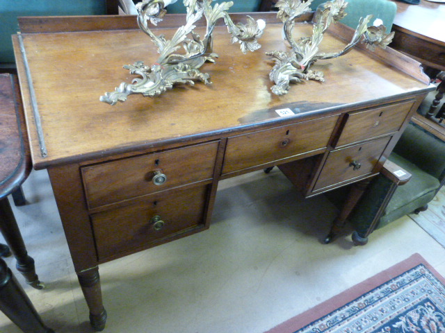 A Victorian mahogany kneehole desk A/F