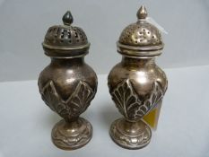 A pair of SCM salt and pepper shakers, marked underneath ORR, both marked with the crest "Deus Major