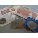 A small quantity of coins and notes
