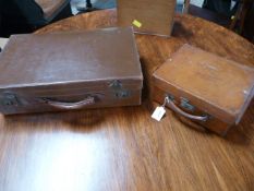 A Vintage leather suitcase, and a fitted leather case stamped "The Right Honourable Lewis Fry"