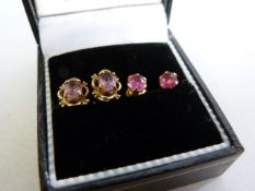 A pair of 9ct gold and amethyst earrings and one other pair