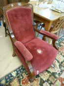 A red upholstered Grandfather chair