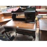 An ornate ladies writing desk on cabriole legs