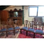 A set of 8 mahogany dining chairs including two carvers ( no pads in carvers)