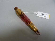 A Victorian cranberry glass scent bottle with gilt decoration