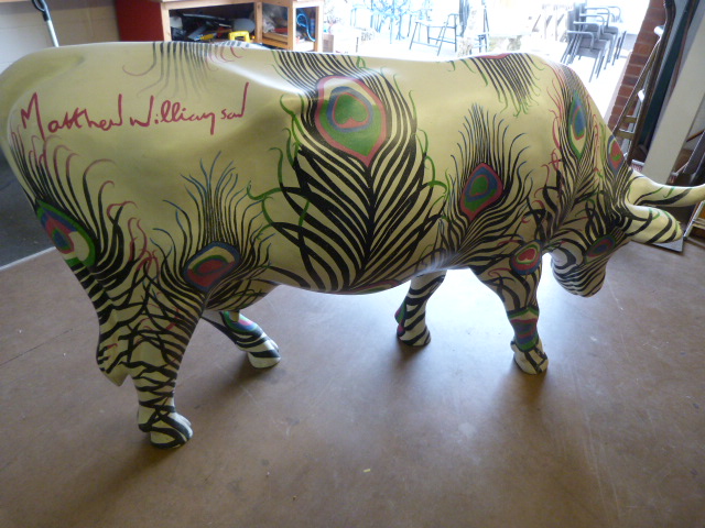 A life size fibreglass model of a cow, painted by Matthew Williamson- this cow was part of the Cow - Image 4 of 4