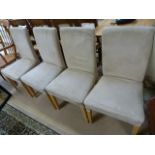 Set of four leather dining chairs