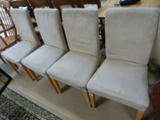 Set of four leather dining chairs