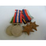 Set of four WW2 medals- Defence medal, war medal, 1939-45 star and Burma star