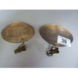 A pair of carved candle shell shades