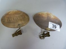 A pair of carved candle shell shades