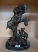 A Modern style bronze of three bear cubs climbing a tree