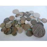 A quantity of various coins, British and American and a "Lusitania" medal