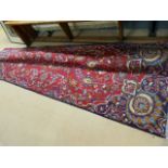 Red ground Persian Kashan carpet