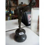 An Art Deco Style bronze of a lady doubled over