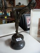 An Art Deco Style bronze of a lady doubled over