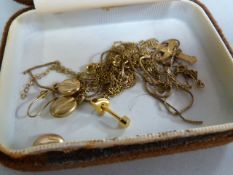 A small quantity of 9 ct gold, including a cross on chain- total weight 6.3g