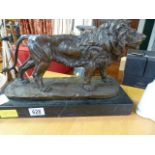 A Bronze Lion on a plinth