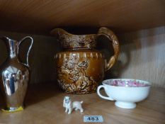 A brown Hound Handle jug, Small Doulton bowl, Wade Whimsie and one other - in aid of Ben