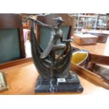 An Art Deco style bronze of a lady in a dance pose