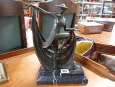 An Art Deco style bronze of a lady in a dance pose