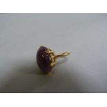 A 9ct ring with amethyst coloured stone