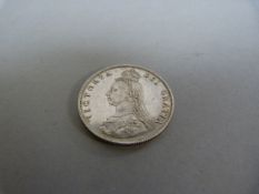 A silver 1857 Victoria jubilee head florin in near mint condition