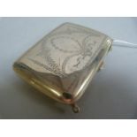 A hallmarked silver purse with leather interior ( hallmark rubbed) total weight 138.8