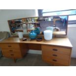 A teak mid century dressing table