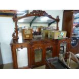 A large Victorian breakfront chiffonier with mirrored back