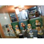 Two Sporting character collection with three footballing feline collection Beswick figures, and 5
